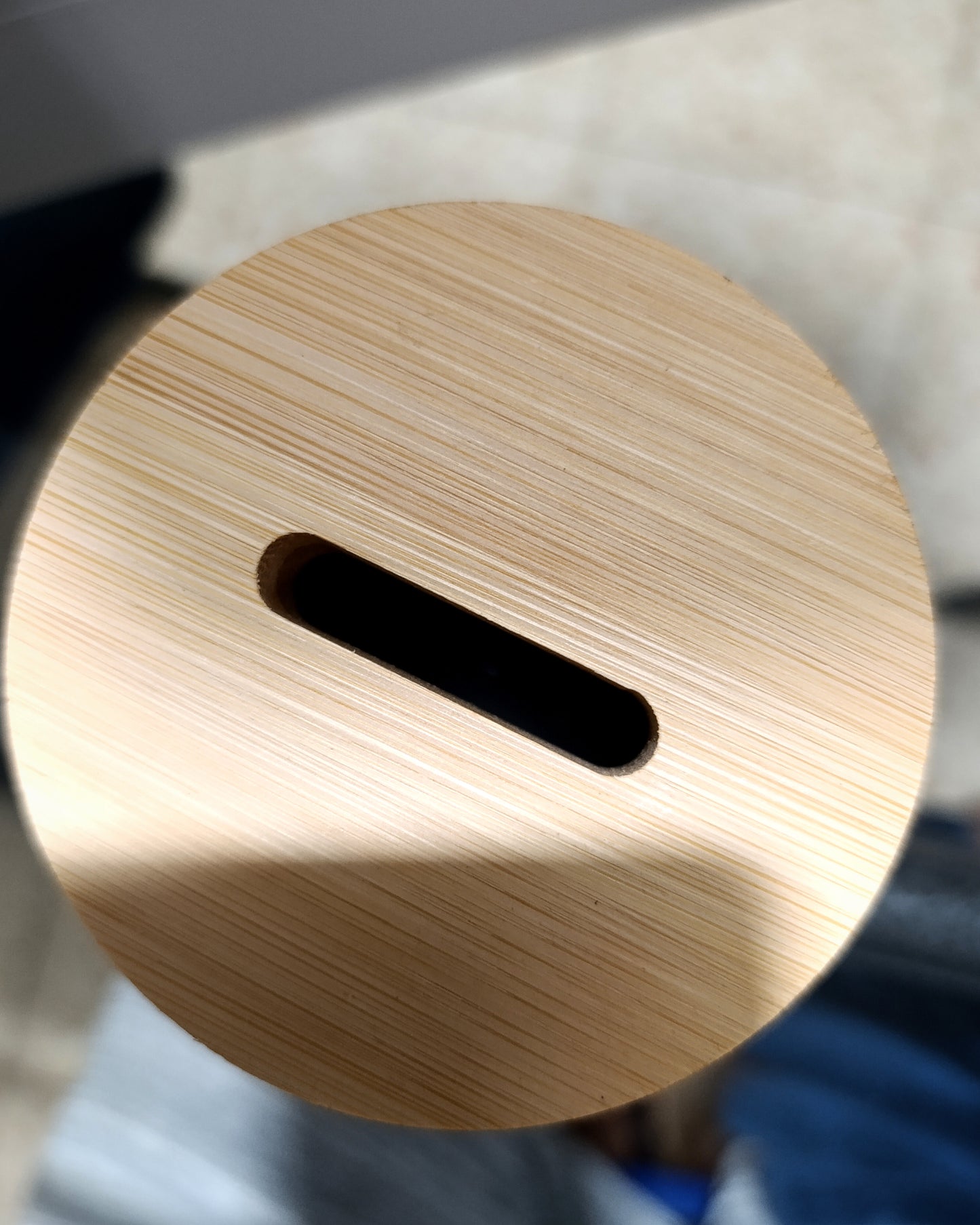 Piggy bank with wooden lid
